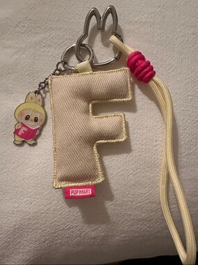 Cream 'F' Letter Keychain with Pink Pop Mart Tag